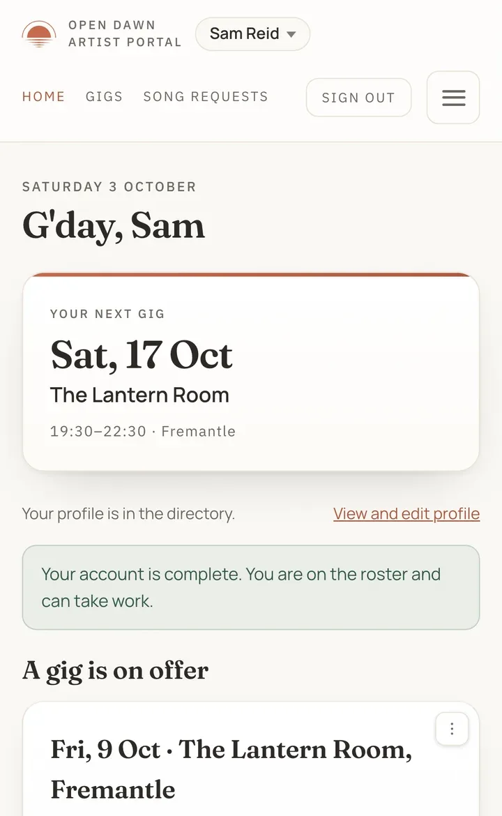 An artist's home screen in the Open Dawn app, showing their next gig, that their profile is in the directory, and that their account is complete and on the roster